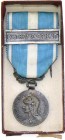 FRANCE
Colonial Medal, instituted in 1893
Breast Badge, private fabrication, 27 mm, silvered Bronze, original suspension ring and ribbon with "Extre...
