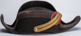 FRANCE
3rd Republic Polytechnic School Bicorne
Black felt hat, with tricolor cocarda and button specific to the polytechnic school. Damaged lining w...
