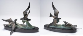 FRANCE
Large bronze decorative 
Large bronze decorative triple patina, subject of birds (sea swallows) playing with the wave. Beautiful chiseled cas...