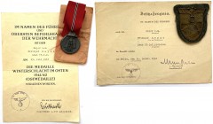 GERMANY - 3RD REICH
Personal Group of Major Frithjof Heyse
Ostmedaille, Breast badge, 42x35 mm, zinc, original suspension ring and ribbon on origina...