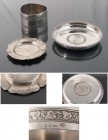 MIXED LOTS
Set consisting of three silver objects
1 / Round engraved napkin, German work (punches) circa 1930. Weight 31 g.
2 / Dish encasing the p...