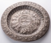 IRAN
Round platter
Silver, stamped model decorated with festive scenes, military and warriors, decor of fruits (pomegranates) on the border, central...