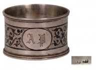 RUSSIA
Silver niello napkin ring
Decorated by a fl oral motive all around, initials and letters (owner) all around, weight 25 g, "84" standard guara...
