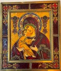 RUSSIA
Polychrome Icon of the Virgin carrying the infant Jesus 
Slave polychrome icon on a metal frame, large rectangular central medallion on the t...