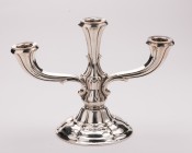 SWITZERLAND
Elegant candlestick in silver 
Elegant candlestick in silver with three arms, baluster model carved on base pedestal and fluted arms. Ha...