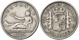1869*1869. Gobierno Provisional. SNM. 1 peseta. (Cal. 15). 4,90 g. ESPAÑA. Rara. BC+/MBC-.