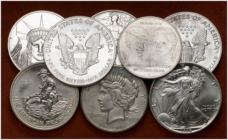 Lote de 8 monedas en plata tamaño "duro", siete americanas y una sueca. A examin...