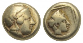 Greek Lesbos, Mytilene EL Hekte. Circa 412-378 BC. 2.51gr 10.18mm
Head of Athena to right, wearing crested Attic helmet / Head of Artemis-Kybele to ri...