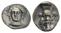 Greek Coins CILICIA. Uncertain. Obol (4th century BC). 0.7gr 9.5mm
 Obv: Head of female (Arethusa?) facing slightly left. Rev: Facing head of Bes
