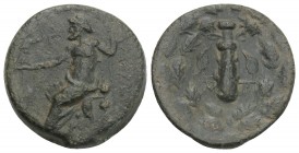 Greek CILICIA. Tarsos (164-27 BC). Ae. 3.5gr 17.5 mm
 Obv: Filleted club; monogram to left and right; all within oak wreath. Rev: TAPCЄΩN. Zeus seated...