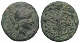 UNCERTAIN. 4th-2nd centuries BC. Æ 16.1mm, 2.8 g 
 Athena Corinthian helmet right / wreath in Nike and wheat ear VF, dark green-brown patina.