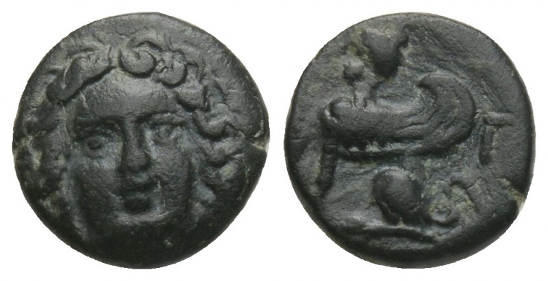 Karia, Kaunos, small bronze, approx. 350 BC 0.8gr 9.6mm
 obv .: female head ., R...