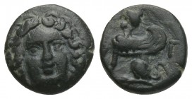 Karia, Kaunos, small bronze, approx. 350 BC 0.8gr 9.6mm
 obv .: female head ., Rev .: Sphinx n