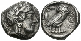 Greek
ATTICA. Athens. Circa 420s-404 BC. Tetradrachm 16.5gr 25.3mm 
Head of Athena to right, wearing crested Attic helmet decorated with three olive l...