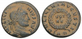 Roman Imperial Licinius I Æ Nummus. AD 320-321. 3.6GR 17.8MM
 IMP LICINIVS AVG, laureate head right / DN LICINI AVGVSTI VOT•XX in laurel wreath