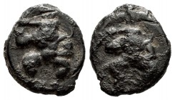 Ebusus. 1/4 calco. 200-100 BC. Ibiza. (Abh-928). Anv.: Bes with hammer and snake. Rev.: Similar to the obverse. Ae. 2,10 g. Very rare. VF/Almost VF. E...