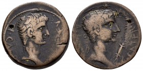 Augustus y Tiberius. AE 28. 14-37 AD. Tarraco. (Sear-303 var.). Anv.: Head of Tiberius right. Rev.: Head of Augustus with radiate crown right, star ab...