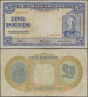 Bahamas: The Bahamas Government 5 Pounds L.1936, P.12a with very low serial number A/1 000400, still nice condition with a few folds and lightly stain...