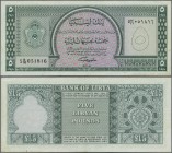 Libya: Bank of Libya 5 Pounds L.1963, P.31, very nice condition with a few folds and lightly stained paper at lower margin, Condition: VF.
 [plus 19 ...