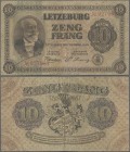 Luxembourg: 10 Frang 1940, P.41, optically appears nice with two small tears at center (1,5 and 2 cm), two small border tears at left and right, Condi...