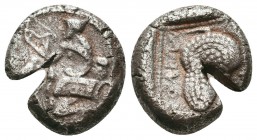 Soloi, Cilicia. AR Stater. c. 425-400 BC.
Obv. Amazon kneeling left holding bow, quiver on left hip; satyr's head in right field.
Rev. ΣOΛEΩN, Grape c...