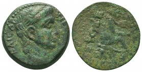 Claudius Æ23 of Caesarea (?), Syria. Dated RY 5 = AD 46. Bare head right / Tyche seated right on rocks, holding grain ears; below, river-god swimming ...