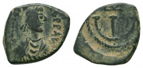 Justinian I. AD 527-565. Ae 
Condition: Very Fine


Weight: 1,5 gram
Diameter: 16,3 mm