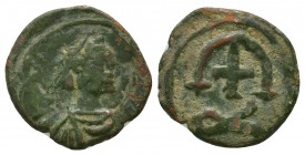 Justinian I. AD 527-565. Ae 
Condition: Very Fine


Weight: 2,2 gram
Diameter: 15,0 mm
