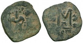 Byzantine Coin ca. 1028-1034. AE 
Condition: Very Fine


Weight: 9,2 gram
Diameter: 30,9 mm