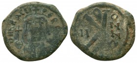 Byzantine Coin ca. 1028-1034. AE 
Condition: Very Fine


Weight: 9,4 gram
Diameter: 22,1 mm