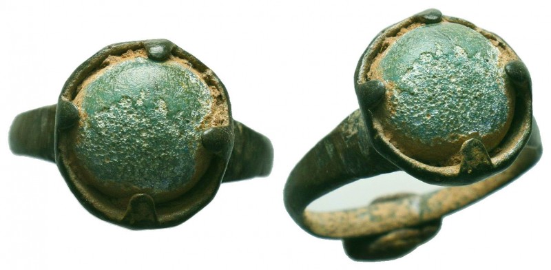 Ancient Roman bronze ring with a stone inlaid on bezel , c. 1st-3rd century AD.
...