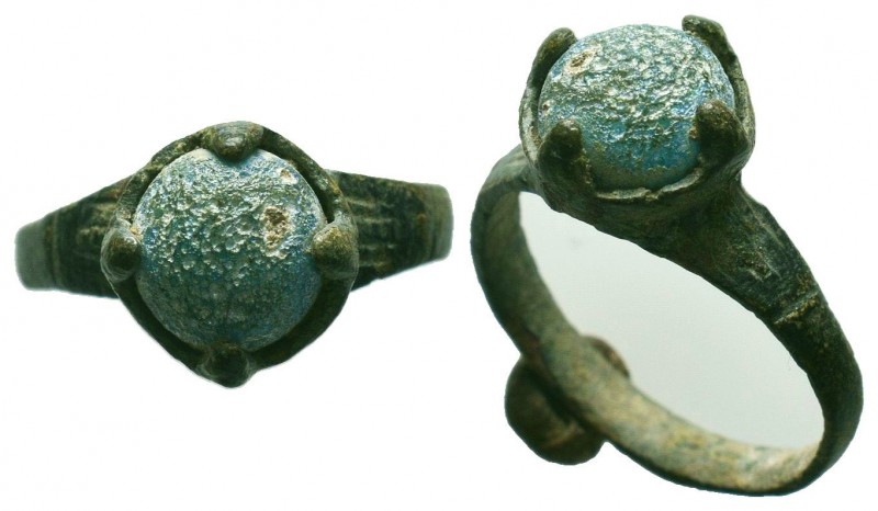 Ancient Roman bronze ring with a stone inlaid on bezel , c. 1st-3rd century AD.
...