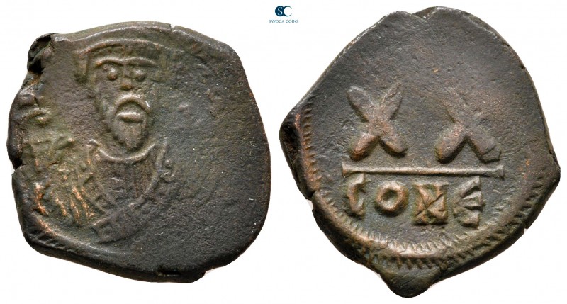 Phocas AD 602-610. Constantinople
Half Follis or 20 Nummi Æ

24 mm., 5,93 g....