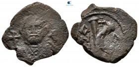 Leontius AD 695-698. Constantinople. Half Follis or 20 Nummi Æ