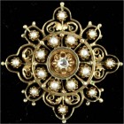 Schmuck und Accessoires aus Gold
Broschen
Jugendstil-Brosche Gelbgold 585/1000 mit 16 Perlen und 1 Diamant. 32 mm; 5,97 g