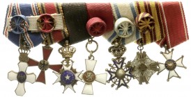 Orden und Ehrenzeichen
Internationale Ehrenzeichen
Siebener-Miniaturspange mit Miniaturen zu Ehrenzeichen von Island, Deutschland (Bundesverdienstkr...