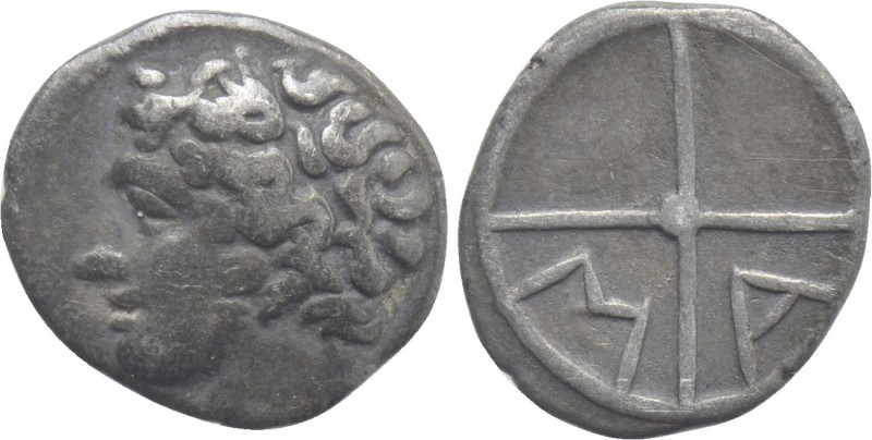 GAUL. Massalia. Obol (Circa 300-100 BC). 

Obv: Bare head of Apollo left.
Rev...