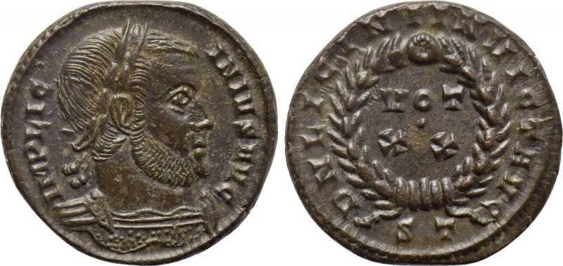LICINIUS (308-324). Follis. Ticinum. 

Obv: IMP LICINIVS AVG. 
Laureate and c...