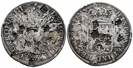 Charles III (1759-1788). 8 reales. 1787. México. FM. (Cal-1131). Ag. 26,93 g. Chop marks. VF. Est...90,00. 

SPANISH DESCRIPTION: Carlos III (1759-178...