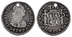 Charles IV (1788-1808). 1/2 real. 1792. Santa Fe de Nuevo Reino. JJ. (Cal 2008-1327). Ag. 1,62 g. Holed. Of the highest rarity. Almost VF. Est...160,0...