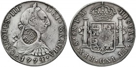 1774. Carlos III. México. FM. 8 reales. Resello F.7º bajo corona (falso). 26,79 g. MBC.