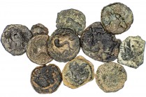 Lote formado por: 7 divisores ibéricos y 4 bronces de Massalia. Total 11 monedas. A examinar. RC/MBC-.