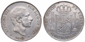 1885. Alfonso XII (1874-1885). Manila (Filipinas). 50 Centavos de Peso. Cy 17566. Ag. 13,02 g. Busto de Alfonso XII con patillas y mirando a dcha /Esc...