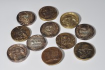 FRANCISCO FRANCO. Colección de 11 medallas de personajes ilustres españoles. AE 62 mm. Fundidas. Algunas plateadas. De MBC a EBC.
