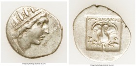 CARIAN ISLANDS. Rhodes. Ca. 88-84 BC. AR drachm (16mm, 2.32 gm, 11h). VF. Plinthophoric standard, Lysimachus, magistrate. Radiate head of Helios right...