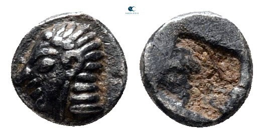 Ionia. Kolophon circa 520-500 BC. 
Tetartemorion AR

5 mm, 0,21 g

Head of ...