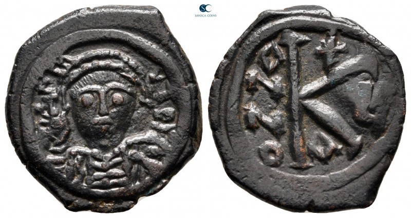 Maurice Tiberius AD 582-602. Constantinople
Half Follis or 20 Nummi Æ

22 mm,...