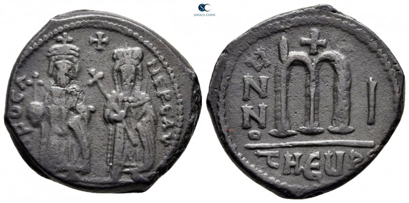 Phocas, with Leontia AD 602-610. Theoupolis (Antioch)
Follis or 40 Nummi Æ

2...
