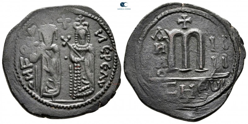 Phocas, with Leontia AD 602-610. Theoupolis (Antioch)
Follis or 40 Nummi Æ

3...