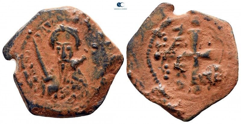 Tancred AD 1101-1112. Antioch
Follis Æ

23 mm, 4,70 g

Half-long figure of ...